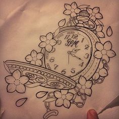 a drawing of an alarm clock with flowers on it