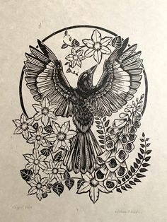 a black and white drawing of a bird with flowers