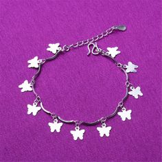 Celebrate sunny days by rolling up your cuffs to reveal this versatile anklet made light-catching with a shining silver plated finish. 9.84" L Lobster claw clasp Silver-plated copper Butterfly Anklet, Foot Chain, Chain Fashion, Ankle Bracelet, Butterfly Charm, How To Make Light, Jewelry Silver, Ankle Bracelets, Bracelet Jewelry