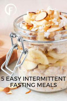 a glass jar filled with cereal and nuts