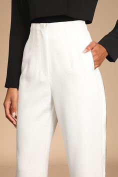 Behind every successful woman, is the Lulus Build Your Dreams Ivory Straight Leg Trouser Pants! These chic office pants are composed of woven fabric that shapes a high-waisted fit with a top clasp, hidden button-closure, and zip fly. Two functional welt pockets top relaxed, straight pant legs that end at a trendy ankle-length hem. Exposed seam detailing gives these pants a tailored finish! Fit: This garment fits true to size. Length: Ankle length. Size medium Inseam: 28.50 Front Rise: 13.75 Wais White Tailored Pants For Semi-formal Occasions, Elegant Cream Formal Pants, White Ankle-length Business Casual Bottoms, Tailored Cream Wide Leg Pants For Formal Occasions, White Tapered Leg Formal Pants, Elegant Cream Ankle-length Pants, Classic White Wide Leg Pants For Work, Tapered Leg Dress Pants For Office, Semi-formal Tailored White Pants