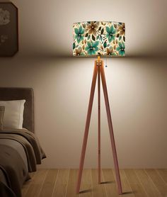 Enhance your living space with our Modern Wooden Tripod Floor Lamp, expertly crafted in the USA. This elegant floor lamp combines a linen lampshade with a sturdy wooden tripod base, offering both durability and style. The linen shade gently diffuses light, creating a soft, eye-friendly glow perfect for any room. With a generous size of 17.7" width x 60.0" height, it makes a striking addition to your decor. Designed for ultimate convenience, this floor lamp features both a pull switch and a remot Light Cottagecore, Wooden Tripod Floor Lamp, Elegant Floor Lamps, Linen Lampshade, Tripod Floor Lamp, Smart Bulb, Floral Home Decor, Tripod Floor Lamps, Linen Shades