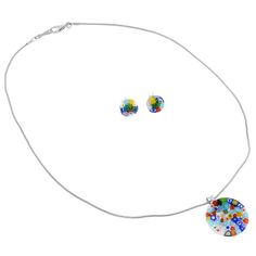 This trendy yet classic Murano Millefiori Pendant and Earrings Set turns any woman into a queen with its bright colors, unique flower patterns, and festive look. With their unique heritage rooted in Venetian history and Murano artisan tradition, Murano glass masters crafted this set using the ancient Millefiori technique. The colorful mosaic design made of tiny pieces of glass fused together in a special furnace is a rare and unique reflection of the beauty of Venice. Measurements: The Murano Gl Multicolor Flower Shaped Jewelry With Matching Earrings, Multicolor Flower Jewelry With Matching Earrings, Multicolor Flower Jewelry Set With Matching Earrings, Elegant Colorful Round Jewelry, Multicolor Round Jewelry Sets For Celebration, Murano Jewelry, Murano Glass Earrings, Heart Christmas Ornaments, Italian Leather Handbags