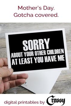 someone is holding up a card that says sorry about your other children at least you have me