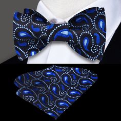 Embrace Elegance: The Mesmerizing Dark Blue and Light Blue Paisley Silk Bow Tie Unveil the epitome of sophistication with our exquisite Dark Blue and Light Blue Paisley Silk Bow Tie. Crafted from the finest silk and adorned with a captivating paisley pattern, this bow tie is more than an accessory; it's a statement of timeless elegance. Join us as we delve into the intricate details, explore versatile pairings, and discover the perfect occasions to let this bow tie be the centerpiece of your ens Elegant Multicolor Evening Sets, Elegant Multicolor Formal Sets, Elegant Blue Sets For Evening, Elegant Blue Evening Sets, Elegant Royal Blue Party Sets, Blue Fitted Suit And Tie Accessories For Black Tie, Blue Suit And Tie Accessories For Summer Party, Elegant Blue Party Ties, Blue Fitted Satin Sets