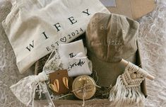 a gift box filled with personal items for a wife