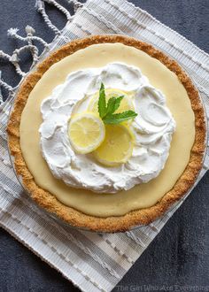 a lemon pie with whipped cream on top