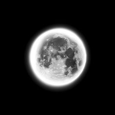 an image of the moon taken from space in black and white with some light on it