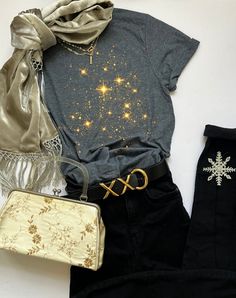 Unleash your inner celestial spirit with our exquisite Golden Moon and Stars T-Shirt. Crafted with love and designed to perfection, this shirt is more than just clothing - it's a statement piece that radiates magic and charm. 🌟 Premium Quality: Our unisex soft-style t-shirt is crafted with 100% ring-spun cotton (4.5 oz/yd providing an ultra-soft, lightweight feel for year-round comfort. 🌙 Versatile Style: With a classic fit and crew neckline, this shirt suits any occasion, from casual outings to semi-formal events. 💫 Tear-Away Label: Enjoy total wearing comfort with our pearlized, tear-away label. 🌱 Ethical & Sustainable: We take pride in using ethically grown and harvested US cotton, ensuring sustainability and quality. Gildan is a trusted member of the US Cotton Trust Protocol for et Star Blouse Outfits, Celestial Spirit, Celestial Shirt, Golden Moon, Zodiac Shirts, Farmer Shirt, Star T Shirt, Comfort Colors Tshirt, Chicken Shirts