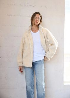 This Boucle Jacket in Natural offers an oversized fit and raglan sleeves for a comfortable and versatile outer layer. The elastic sleeve and button closure provide a secure fit, while the front pockets offer convenient storage. Stay cozy and stylish with this must-have jacket. 100% polyester Dry clean Cozy Oversized Outerwear With Pockets, Cozy Outerwear With Button Cuffs, Cozy Button-up Outerwear With Button Cuffs, Cozy Long Sleeve Outerwear With Buttoned Pockets, Cozy Cream Outerwear For Everyday Wear, Cozy Outerwear With Pockets, Cozy Outerwear With Pockets For Layering, Cozy Button-up Outerwear For Layering, Cozy Relaxed Fit Button-up Outerwear