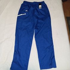 Brand: Adidas Style: Team Sports Woven Pants Color: Collegiate Royal Blue/ White Size: Small Has Zippers On The Legs, Drawstring At The Waist And Two Front Hand Pockets And One Pocket On The Right Leg. Nwt. No Box. Pet And Smoke Free Home Bin#234 Adidas Cotton Gym Pants, Adidas Jogging Bottoms With Pockets, Adidas Joggers With Pockets For Sports, Adidas Blue Sweatpants For Jogging, Blue Adidas Activewear For Jogging, Adidas Sportswear Pants With Moisture-wicking, Adidas Moisture-wicking Sportswear Pants, Adidas Sportswear Sweatpants With Pockets, Adidas Blue Jogging Bottoms