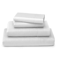 four white sheets stacked on top of each other