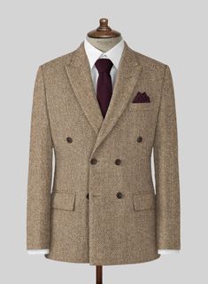 The Irish Brown Herringbone Tweed Jacket will become the standard of business dressing and by far the most ubiquitous option. Crafted from wool, the Irish Brown color of the jacket will surely influence a veteran dresser to buy the jacket for building a sharp wardrobe. Team it up with matching trousers, white shirt and dark brown derby shoes. 
 
 Look Includes  Irish Brown Herringbone Tweed Fabric  Double Breasted Jacket Style  Peak Lapel  Horn Brown Buttons  Single Vent  Three Cuff Buttons   Yo Business Casual Tweed Blazer With Suit Collar, Tweed Jacket For Formal Winter Occasions, Semi-formal Fall Herringbone Suit, Single-breasted Tweed Jacket With Notch Lapel, Classic Brown Double Breasted Suit For Winter, Formal Tweed Sport Coat With Notch Lapel, Formal Tweed Jacket With Welt Pockets, Brown Tweed Blazer For Formal Occasions, Formal Brown Tweed Blazer