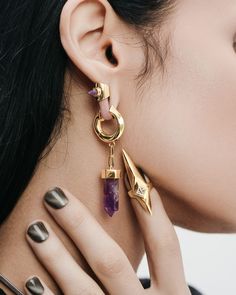 An elusive, ethereal element, the AETHER binds life in cyclical codes to bear your evolving modalities. Our iconic classic Lobe Cuff™ silhouette featuring a raised smoky quartz or amethyst pyramid. Style it horizontally on your side lobe by hiking it up high, or wear it hanging naturally on your lobe's lower arc. Fits piercings stretched at 8mm and above. Complete your look with other jewelry from the AETHER series. Sold as a pair. Each charm features a natural clear quartz that is lovingly craf Stretched Lobes, Art Jewelry Design, Silver Nail, Nail Ring, Unisex Ring, Online Jewelry Store, Amethyst Crystal, Smoky Quartz, Jewelry Store