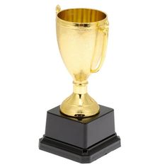 a gold trophy sitting on top of a black pedestal