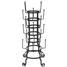 a black metal rack with multiple hooks on it's sides and two wheels attached to the top