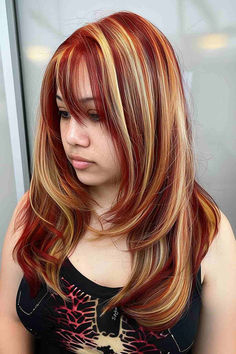 Red hair with chunky blonde accents. Red Orange Hair With Blonde Money Piece, Red Hair With Chunky Highlights, Chunky Red And Blonde Highlights, Red Hair With Platinum Highlights, Alternative Hair Color Ideas Blonde, Chunky Ginger Highlights, Ginger Chunky Highlights, Blonde Hair With Chunky Highlights, Dark Red Hair Blonde Highlights