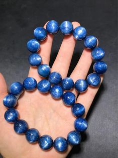 Material:Natural Kyanite Gemstone size :  approx 16mm   quantity: one strand 6mm approx 29 pcs one strands 7mm approx25 pcs one strands 8mm approx 22 pcs one strands 9mm approx 21pcs one strands 10mm approx 19 pcs one strands 11mm approx 18pcs one strands 12mm approx 16 pcs one strands 13mm approx 16 pcs one strands 14mm approx 15 pcs one strands 15mm approx 14pcs one strands 16mm approx 14 pcs one strands 17mm approx 13pcs one strands 18mm approx 13pcs one strands 19mm approx 12pcs one strands Sapphire Round Bead Bracelets Gift, Sapphire Round Beads Bracelet Gift, Sapphire Round Beads Bracelet For Gift, Sapphire Round Beads Bracelet As Gift, Sapphire Gemstone Beads Bracelets, Bracelet For Friends, Kyanite Bracelet, Friends Jewelry, Friend Jewelry