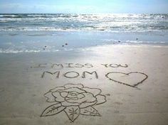 someone wrote this message on the sand at the beach and it looks like they are in love