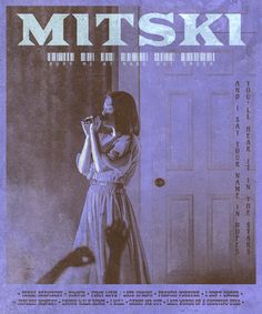 a woman standing in front of a door with her hands behind her head and the words mtsk on it