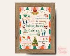 the christmas tree is hanging in front of a wooden framed wall mounted art piece with words on