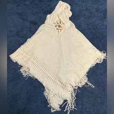 One Size Poncho Style Knit Sweater. Beautiful Off White Color. It Is Very Roomy- So One Size Fits All Is Accurate. Perfect Condition As It’s Brand New, It Is Hooded As Well. Neck Ties And Can Be Adjusted. Casual White Cotton Poncho, Casual Beige Poncho For Vacation, White Cotton Poncho For Vacation, Poncho Style, Neck Ties, Poncho Sweater, Shrug Sweater, Off White Color, Ponchos