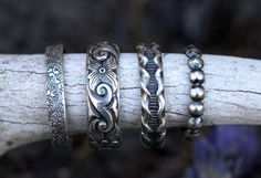 This listing is for ONE sterling silver stacking band. This thick sterling silver band features a beautiful and deeply engraved filigree pattern. Wear it alone or with other stacking rings. I love wearing my stacking set on my thumb to compliment other beautiful rings on my other fingers. The combinations are endless. Want the whole set? Buy it here: https://www.etsy.com/listing/493597787/sterling-silver-stacking-rings-sterling?ref=shop_home_active_1 -Choose your size at checkout! - Ring measure Silver Stamped Jewelry With Round Band, Stamped Silver Round Band Jewelry, Silver Rings With Unique Variations For Anniversary, Silver Rings With Unique Designs For Anniversary, Silver Stackable Jewelry, Silver Stackable Rings, Silver Mens Ring, Silver Ring Band, Stackable Rings Silver