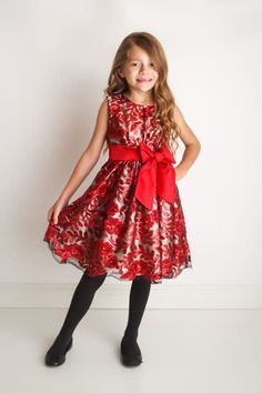 OUR DESIGN - THE BELLA DRESS This beautiful handmade dress will add a little magic to your little girl's special event! It's classy and sweet with a festive twist perfect for any event. This dress incorporates a floral pattern composed of red sequins in black tulle. The gown is tied together with a playful bow around the waist.  *Made up of satin, polyester, and nylon fabrics with sequins and embellishments *A ruffled skirt adds volume  *Handmade in the USA *A puffy skirt can be included as an add-on for only $10-$25 extra! * The listing is for the Bella dress only OUR PROMISE We only use the highest quality fabrics to handmade unique and memorable pieces for your little one. We design and create this piece with love and with attention to detailed.  *Please refer to our Q&A section before Elegant Red Dress For Holiday Dress-up, Red Sleeveless Princess Dress For Christmas, Red Sleeveless Christmas Princess Dress, Red Princess Holiday Dress, Holiday Red Dresses With Red Bow, Red Holiday Dress With Red Bow, Red Holiday Dress With Bow, Red Princess Dress For Holiday, Christmas Red Princess Dress For Fancy Dress