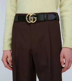 Enhance your look with this iconic Gucci leather belt. Crafted in Italy, it features supple calf leather and polished gold hardware for a timeless, luxury aesthetic. The coveted double G buckle logo ensures all eyes will be on your outfit. Thanks to adjustable punch holes, it effortlessly pairs with everything from jeans to suits. A lifestyle staple that elevates any 'fit for Instagram, this must-have belt brings classic GG style to your collection. Gucci Black Belt Buckles With Removable Belt, Gucci Black Belt Buckle For Formal Wear, Elegant Black Gucci Belt Buckles, Gucci Black Belt Buckle For Formal Occasions, Gucci Designer Belt Buckles For Business, Classic Black Gucci Belt Buckles, Black Gucci Belt Buckle For Formal Wear, Gucci Elegant Business Belt, Classic Gucci Belt For Business