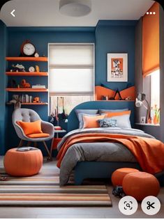 a bedroom with blue walls and orange accents