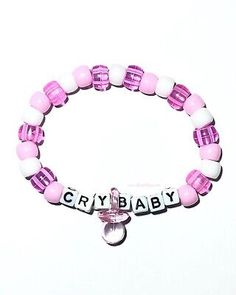 CRY BABY Kandi Beaded BraceletThis bracelet is made with baby pink, transparent pale pink, and white pony beads with the wording CRY BABY and a transparent pale pink pacifier in between the wordsAvailable SizesOSFM5 - 5.5 inches 5.5 - 6 inches 6 - 6.5 inches 6.5 - 7 inches 7 - 7.5 inches 7.5 - 8 inches 8 - 8.5 inches 8.5 - 9 inches If you need a certain size not available please send us a message. Adjustable Beaded Bracelets For Birthdays, Cute Beaded Crystal Bracelet Gift, Cute Beaded Crystal Bracelet For Gift, Adjustable Beaded Charm Bracelet For Birthday, Cute Beaded Crystal Bracelet As Gift, Adjustable Beaded Crystal Bracelet For Birthday, Pink Pacifier, Melanie Concert, Diy Kandi Bracelets