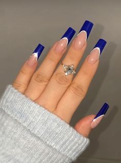 The latest nail style trend to hit Instagram is a creative way to celebrate the season. Users are uploading images of nails painted to look like the knit sweaters that are perfect for this time of the year.  .. Nails 2023 Trends Latina, Royal Blue V French Tip Nails, Royal Blue Acrylic Nails Sweet 16, Royal Blue French Tip Nails With Rhinestones, Dark Blue Glitter French Tip Nails, Navy Blue French Tip Nails Coffin, Midnight Blue And Silver Nails, Nails Acrylic Blue French Tips, Blue French Tip Nails Long