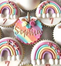 cupcakes decorated with unicorn and rainbow decorations