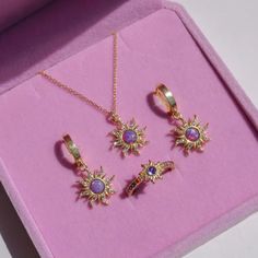 Discover our stunning Celestial Magic Opal Sun Jewelry Set, featuring a vintage gold ring, bracelet, necklace, and earrings adorned with opal sunstones. Add a touch of magic to your ensemble. Purple Opal Jewelry, Gold Purple Jewelry, Purple Gold Jewelry, Purple And Gold Jewelry, Disney Princess Jewelry, Purple Jewelry Set, Tangled Jewelry, Tangled Necklace, Sun Jewelry