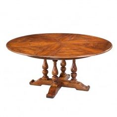 an oval wooden table with four legs