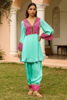 Sea green kurta featuring embroidered with beadwork, zardozi, cutdana work on the front yoke. Paired with an embroidered hem salwar. Comes with a sheer ombre dupatta featuring butterfly motifs and beadwork. - Aza Fashions Green Embellished Sets For Eid, Green Embellished Kurta For Eid, Embellished Green Salwar Kameez For Eid, Traditional Embellished Green Palazzo Set, Festive Turquoise Embroidered Sets, Designer Green Palazzo Set With Embroidered Border, Designer Green Embroidered Palazzo Set, Fitted Green Embellished Kurta, Festive Embroidered Turquoise Sets