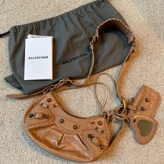 Brand New Balenciaga Le Cagole In Limited Edition Color. Included Dust Bag And Certificate Of Authenticity. Pristine Condition. Used About 2 Or 3 Times. Balenciaga Le Cagole Rhinestone, Bags Balenciaga, Balenciaga Bag, Certificate Of Authenticity, Beige Color, Emboss, Balenciaga, Dust Bag, Limited Edition