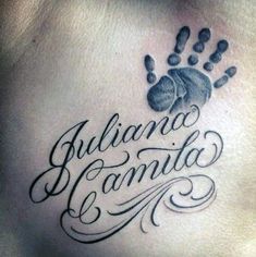 a tattoo with the words juliana and an animal paw on it's side chest