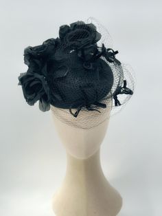 Classy & elegant black fascinator hat with handmade silk roses & delicate vintage netting. One of a kind Ready to ship Fits comfortably with an elastic band tucked under the hair at the nape of the neck. Black Mini Hat For Kentucky Derby Wedding, Black Costume Hats For Kentucky Derby Wedding, Fitted Black Headpiece For Vintage Events, Black Kentucky Derby Costume Hat, Black Mini Hat For Vintage Events And Kentucky Derby, Evening Fitted Headpiece With Handmade Flowers, Handmade Flowers Fascinator For Kentucky Derby Evening, Kentucky Derby Evening Fascinator With Handmade Flowers, Elegant Black Party Veil