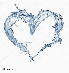 water splashing into the shape of a heart on white background stock photo - image