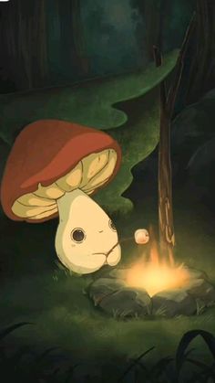 a mushroom is sitting next to a fire in the forest