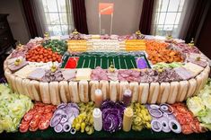 a football field made out of sandwiches and vegetables