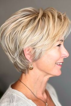 Rounded Pixie Hairstyle on smiling older woman with blonde hair, side view. Pixie Bob Haircut Back View, Longer Short Hair, Short Silver Hair Pixie Cuts Older Women, Short Haircuts For Older Women, Bob Haircut Back View, Short Silver Hair, Choppy Hair, Long To Short Hair, Short Choppy Hair