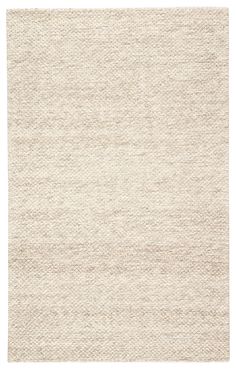 an area rug with white and beige colors on the bottom, in front of a white background