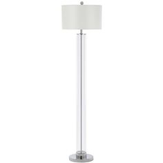 a floor lamp with a white shade on it