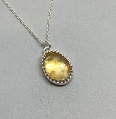 Love, sparkly citrine pendant, solid silver construction with a natural, ethically-sourced gemstone that makes for a lovely everyday pendant or layering piece! It measures 1/2" tall and you can choose a chain of either 16" or 18" in length. Crafted by hand!! And comes in a gift box for easy giving. :) 💎 Love citrine? Here is a ring to match!  https://www.etsy.com/listing/1658934890/elegant-citrine-solitaire-ring-bohemian?ref=listings_manager_grid 💎 Here is an entirely different citrine ring: https://www.etsy.com/listing/1732718105/citrine-sterling-ring-with-twig-style?ref=listings_manager_grid 💠 Click here to return to my shop: https://www.etsy.com/shop/Mementometal?ref=profile_header ✏︎✏︎✏︎✏︎✏︎✏︎✏︎ 💘Happy customers have this to say about MementoMetal designs! ✏️ I am in love with this Silver Citrine Birthstone Necklaces, Silver Citrine Birthstone Necklace, Silver Citrine Necklaces With Birthstone, Silver Citrine Necklace With Birthstone, Silver Citrine Gemstone Necklaces, Silver Faceted Citrine Necklace, Silver Citrine Gemstone Necklace, Faceted Silver Citrine Necklace, Minimalist Silver Citrine Jewelry