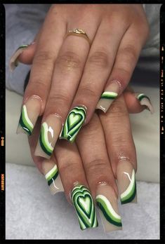 Acrylic Nails Y2k Aesthetic Nails Green, Acrylic Nail Heart Designs, Green Heart Acrylic Nails, Green Heart Nail Designs, Nail Art On Green Nails, Different Green Nails, Green Hearts Nails, St Pattys Day Nails Acrylic, Line Green Nails