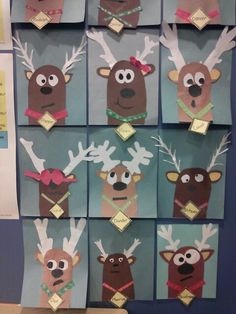 paper cut out of reindeer's heads and antlers with name tags on them