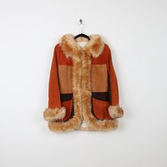 Tag: None Size: None listed (fits like a medium) Pit to Pit: 21' Length: 30' Vintage Fall Outerwear With Faux Fur Lining, Retro Fall Fur Coat With Faux Fur Lining, Retro Fur Coat With Faux Fur Lining For Fall, Retro Faux Fur Lined Coat For Fall, Retro Brown Outerwear With Faux Fur Trim, Retro Brown Outerwear With Faux Fur Lining, Retro Brown Fur Coat For Fall, Vintage Brown Patchwork Outerwear, Retro Brown Patchwork Outerwear