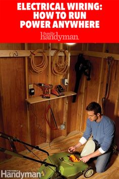 a man is working on an electric lawn mower in his garage with the words electrical wiring how to run power anywhere